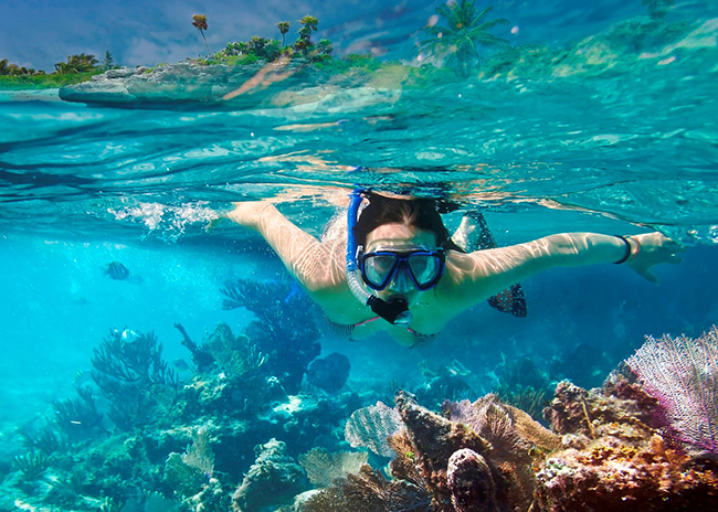 Mary having a good time snorkeling in Cozumel.